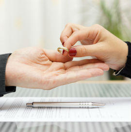 woman giving back wedding ring